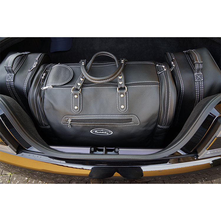 aston martin v8 vantage roadster väskor i bagage