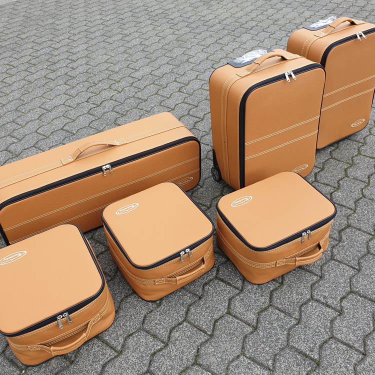 inspiration bagageväskor beige läder gul söm ferrari portofino