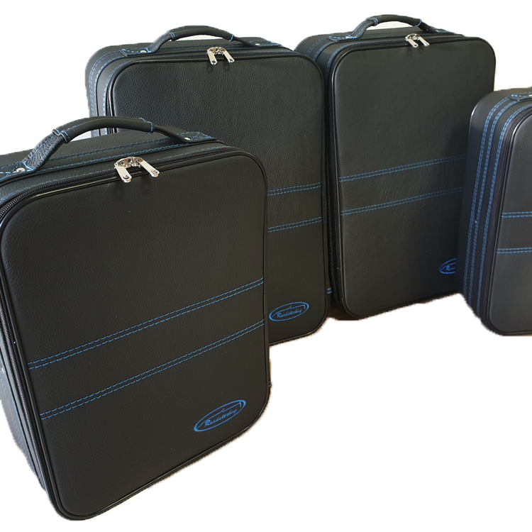 inspiration bagageväskor svart läder blå söm